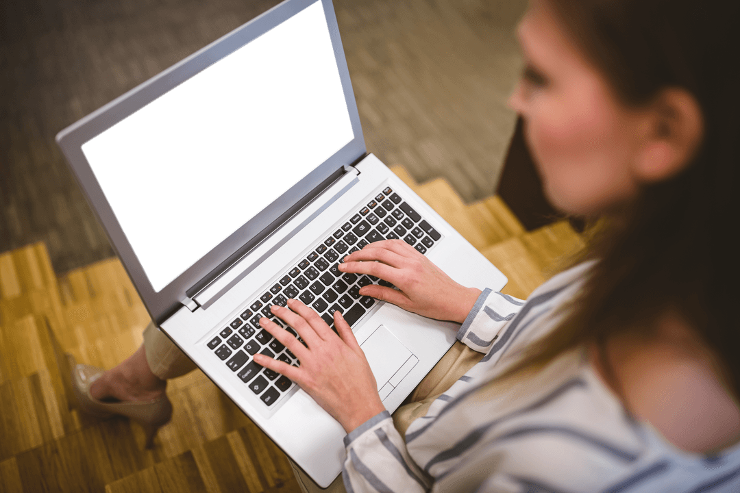 Top-View Woman Typing on Transparent Laptop Keyboard