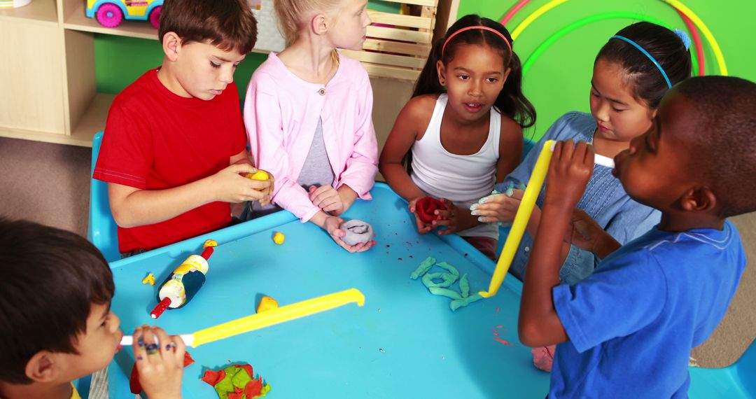 Diverse Group of Children Playing with Playdough in Kindergarten Classroom - Free Images, Stock Photos and Pictures on Pikwizard.com