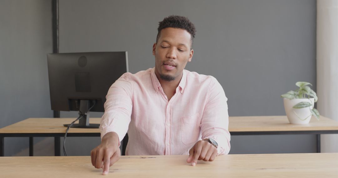 Businessman Explaining Ideas at Office Desk