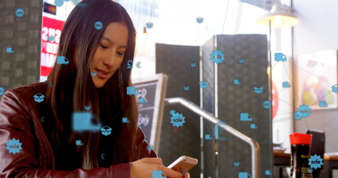 Woman Using Smartphone Amidst Digital Icons at Cafe