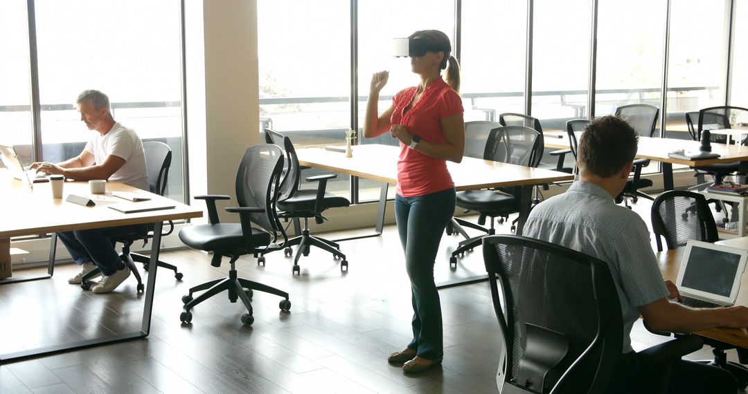 Employees Working in Modern Office with VR Technology - Free Images, Stock Photos and Pictures on Pikwizard.com