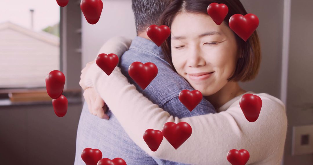 Happy Couple Embracing with Heart Graphics Indoors