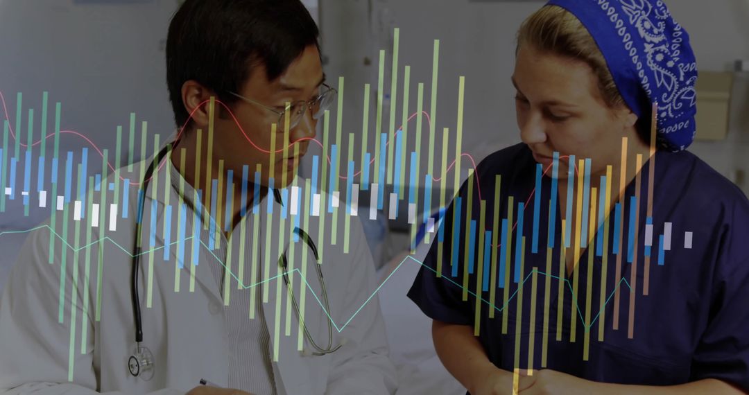 Doctor and Nurse Analyzing Data Charts in Medical Setting