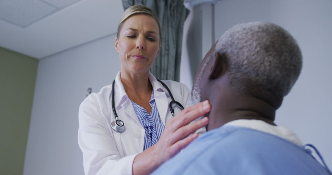 Female Doctor Examining Elderly Male Patient in Hospital - Free Images, Stock Photos and Pictures on Pikwizard.com