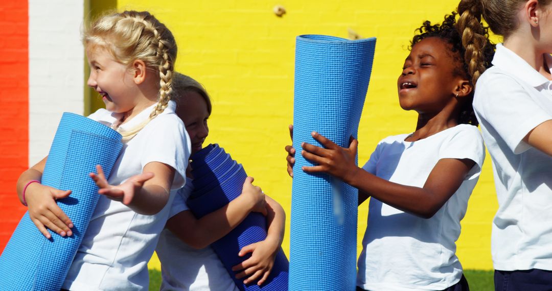 Diverse Children Holding Yoga Mats Outside - Free Images, Stock Photos and Pictures on Pikwizard.com