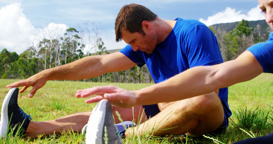 Fitness Enthusiasts Stretching Outdoors - Free Images, Stock Photos and Pictures on Pikwizard.com