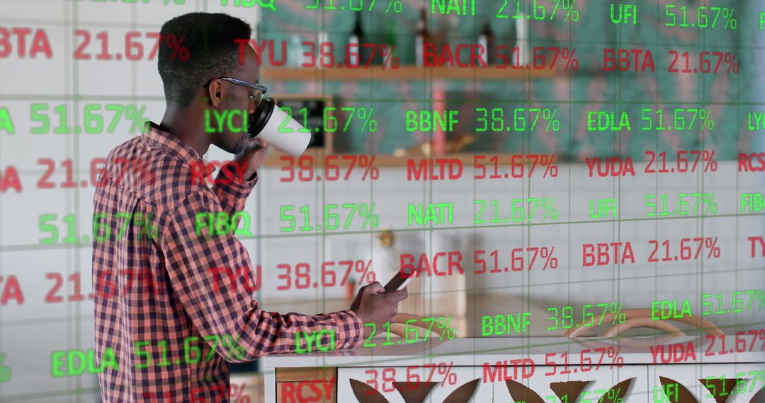 African American Man Engaging with Digital Data Display