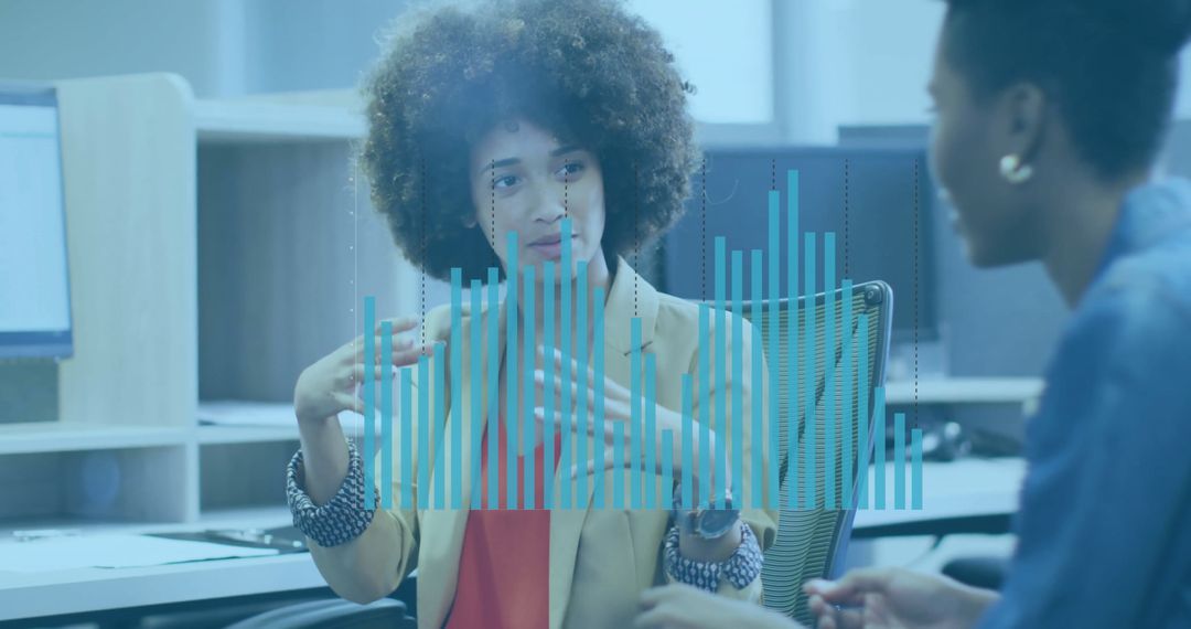 Collaborative Business Meeting Discussing Data Analytics in Modern Office