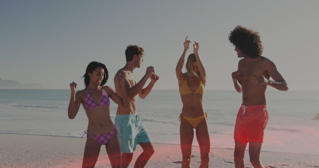 Group of Friends Dancing on Beach at Sunset - Free Images, Stock Photos and Pictures on Pikwizard.com