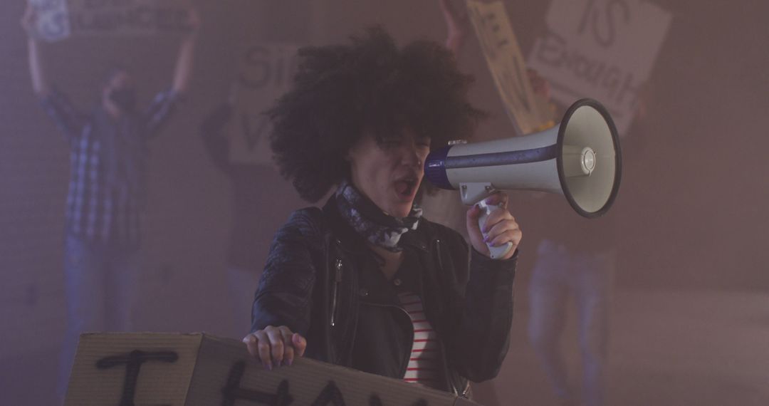 Activist Speaking Into Megaphone During Protest - Free Images, Stock Photos and Pictures on Pikwizard.com