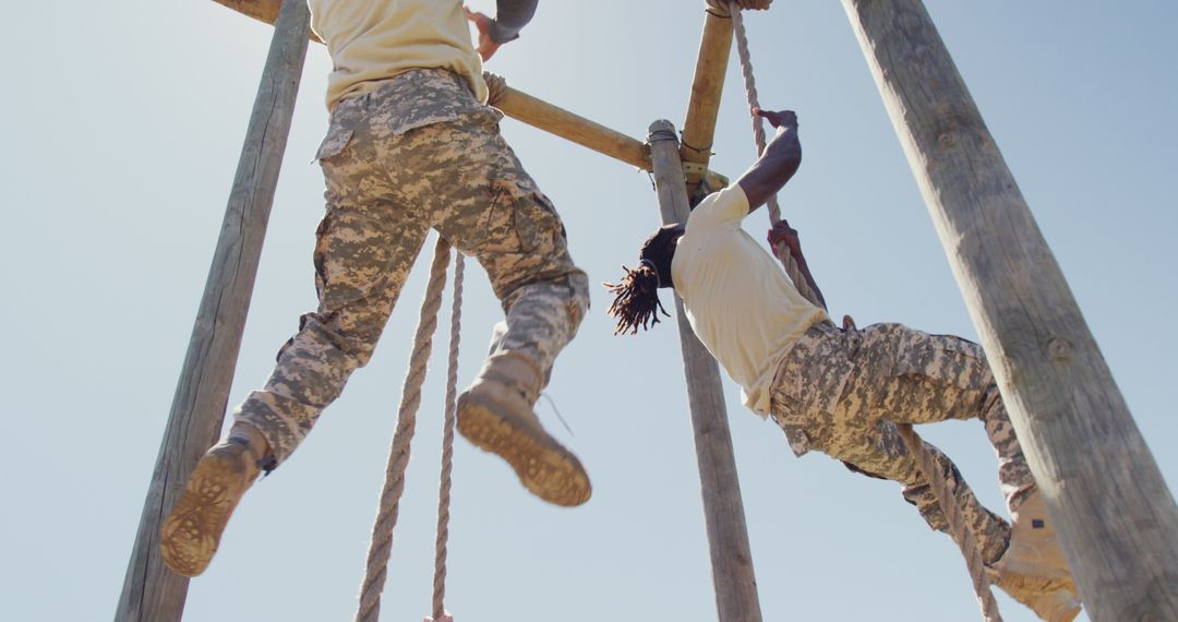 Soldiers Conquering Obstacle Course in Training
