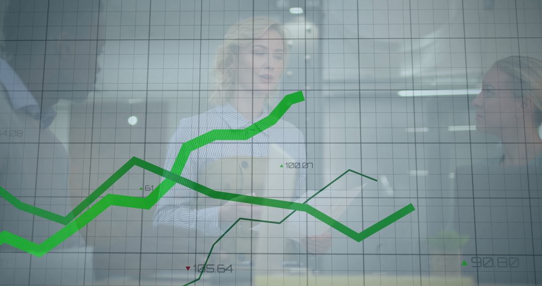 Colleagues Discuss Financial Data with Digital Graph Overlay