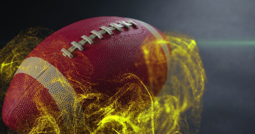 Dynamic Rugby Ball with Fiery Elements on Gray Background