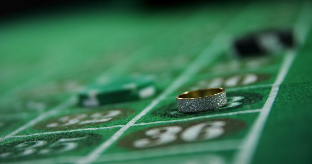 Close Up of Glittering Wedding Ring on Casino Roulette Table - Free Images, Stock Photos and Pictures on Pikwizard.com