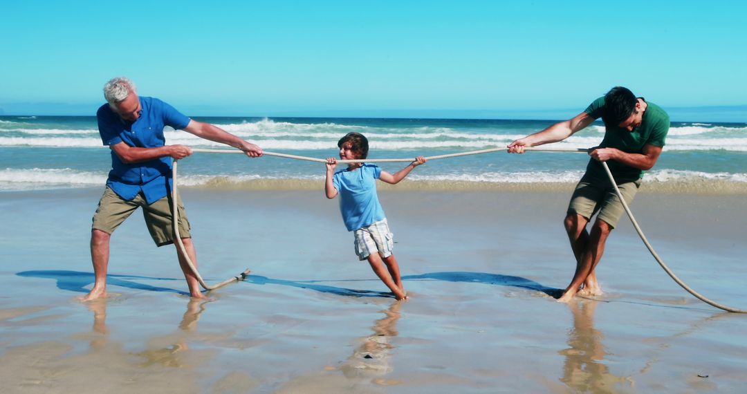 Multigenerational Family Playing Tug of War on Sunny Beach - Free Images, Stock Photos and Pictures on Pikwizard.com