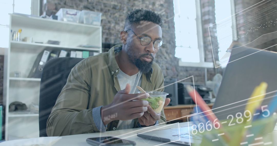 Businessman Analyzing Data Metrics During Lunch Break
