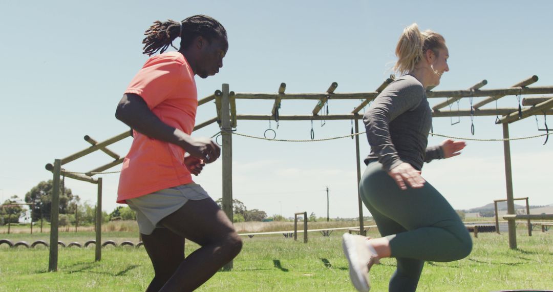 Diverse Individuals Training on Outdoor Obstacle Course