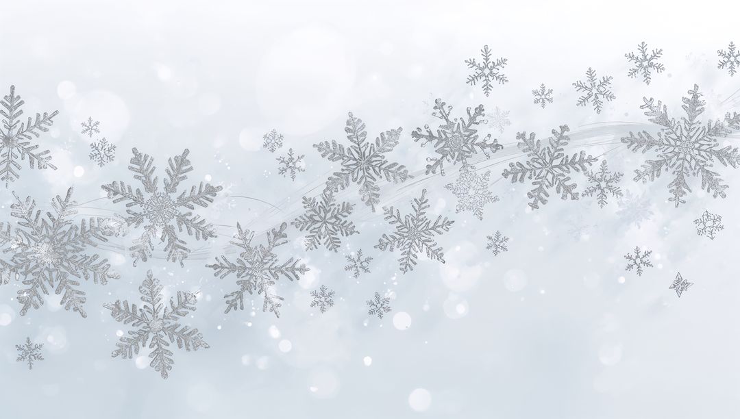 Drifting Silver Snowflakes on Pale Blue Bokeh Background for Winter Holiday Design