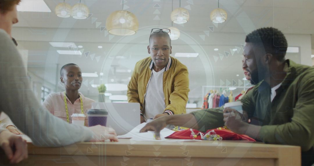 Creative Fashion Designers Collaborating in Modern Studio Environment