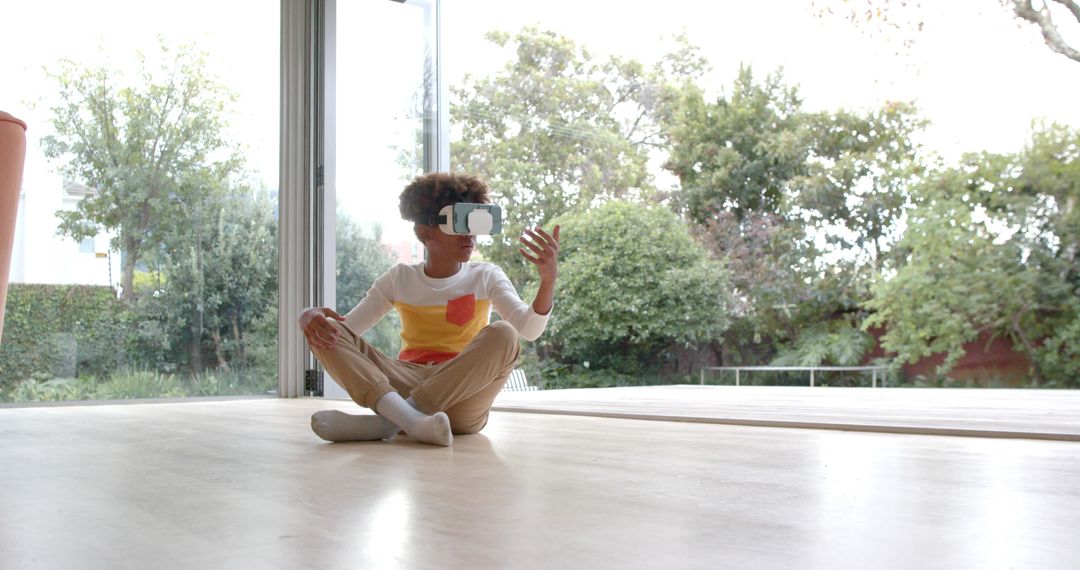 Young Boy Immersed in Virtual Reality Experience at Home