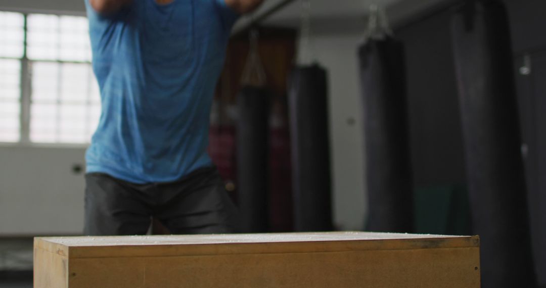 Man Performing Box Jumps in Gym - Free Images, Stock Photos and Pictures on Pikwizard.com