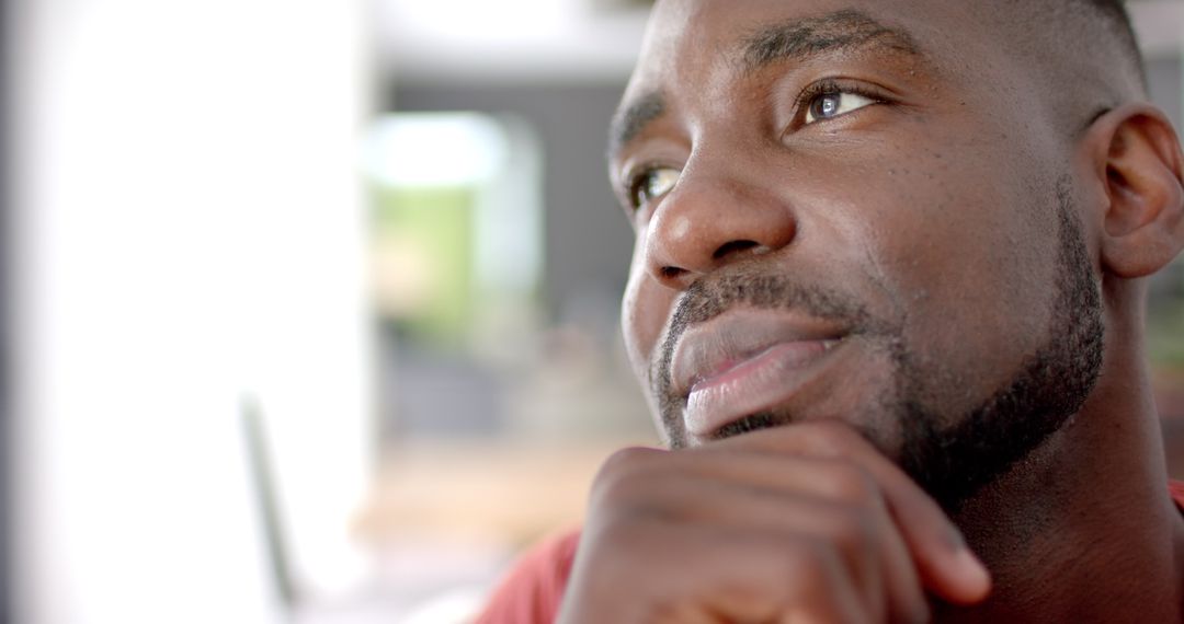 Contemplative African American Man Thinking at Home