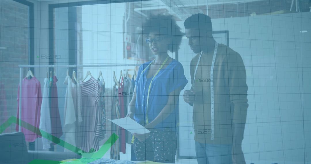 Fashion Designers Strategizing with Fabric Swatches and Data