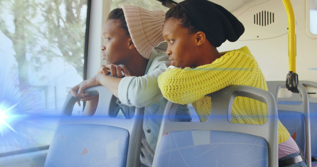 Contemplative Women on Bus with Dreamy Light Effect