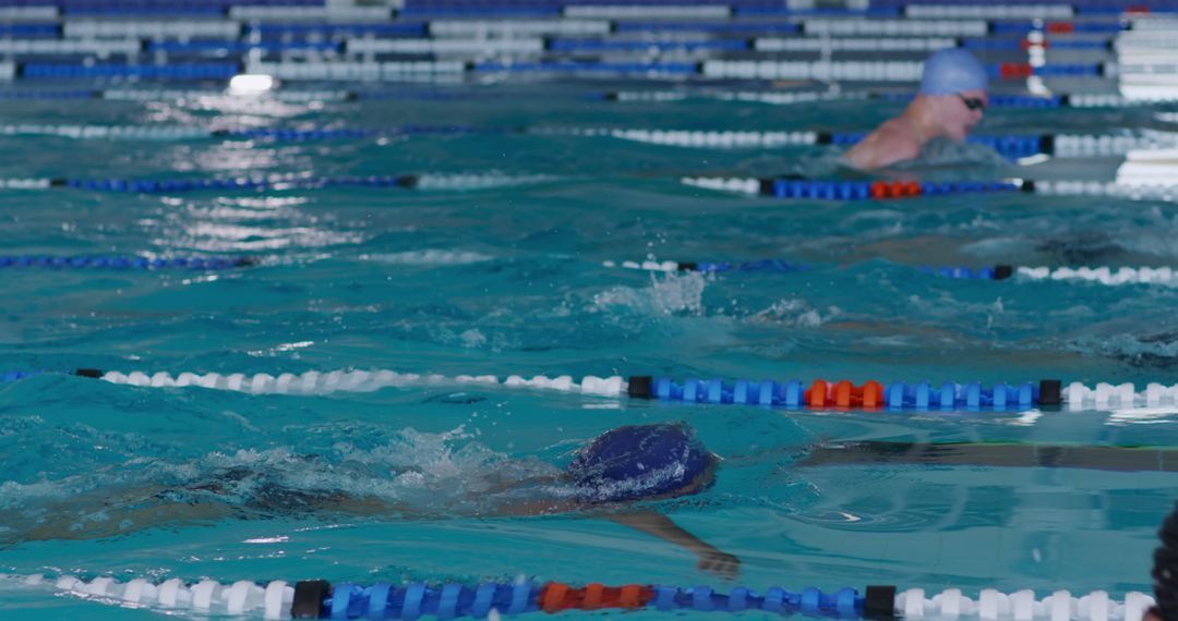 Swimmers Practicing in a Lap Pool - Free Images, Stock Photos and Pictures on Pikwizard.com