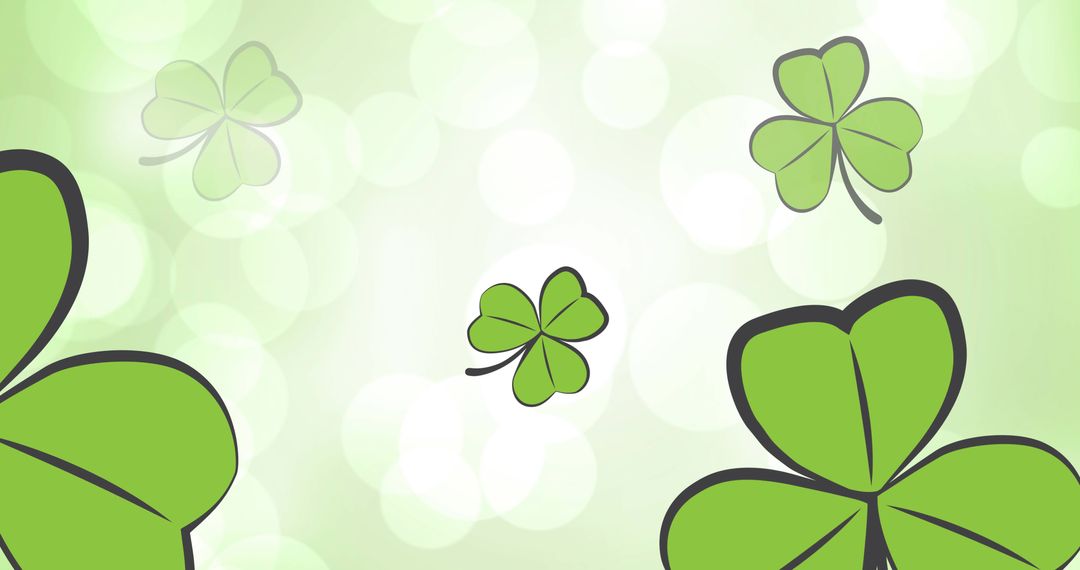 Clover Leaves Falling on Light Green Bokeh Background