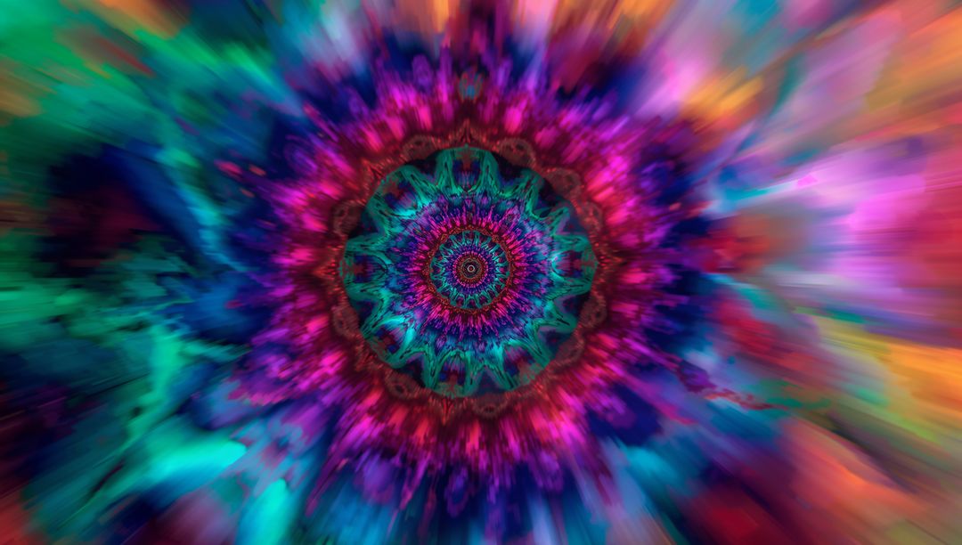 Kaleidoscopic Fractal Mandala with Vibrant Blurred Rays
