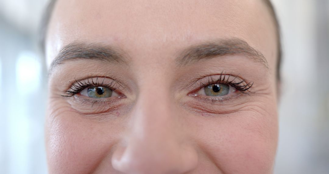 Close-Up of Smiling Woman's Eyes with Natural Makeup - Free Images, Stock Photos and Pictures on Pikwizard.com