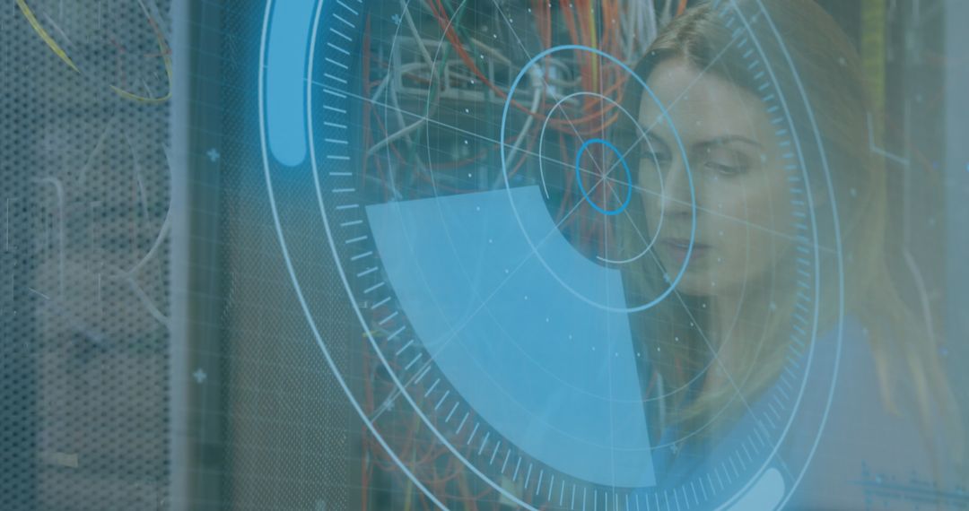 Woman Monitoring Digital Interface in Server Room
