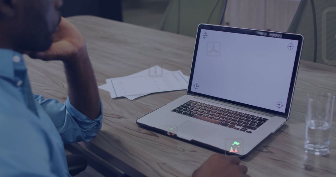 Business Meeting Concept with Man Reviewing Laptop