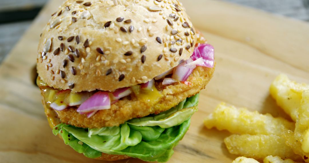 Close-up of Veggie Burger with Sesame Bun and Lettuce - Free Images, Stock Photos and Pictures on Pikwizard.com