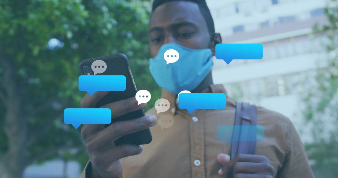 Man With Mask Checking Messages Urban Environment