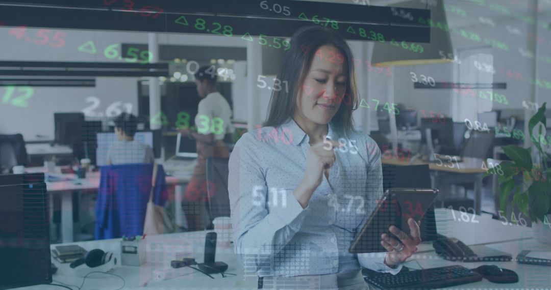 Business Professionals Analyzing Financial Data on Digital Screens