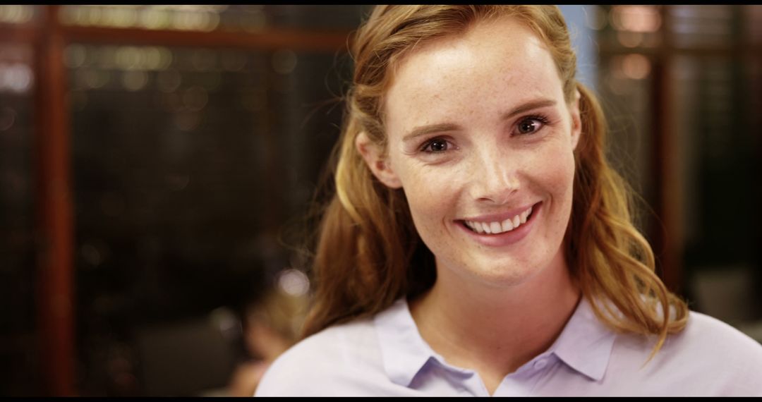 Smiling Teacher in Classroom Ready for Interactive Learning