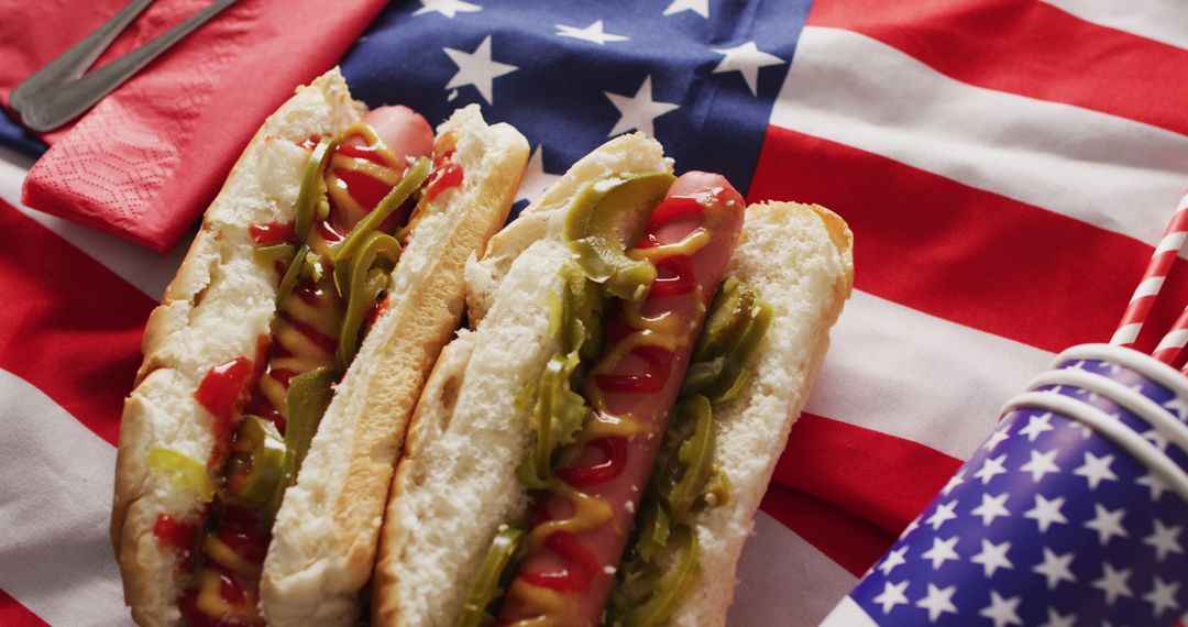 Hot Dogs with Condiments and American Flag for Fourth of July Celebration - Free Images, Stock Photos and Pictures on Pikwizard.com