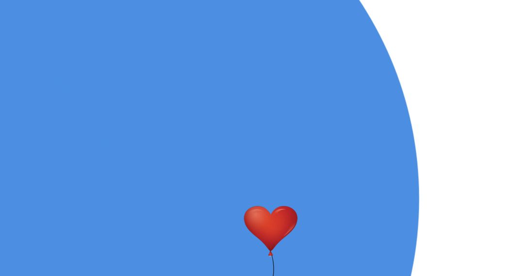 Red Heart Balloon Floating on Minimalistic Blue Background