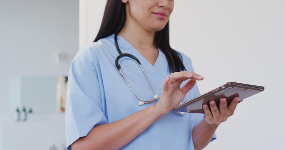 Female Nurse Using Digital Tablet in Hospital - Free Images, Stock Photos and Pictures on Pikwizard.com