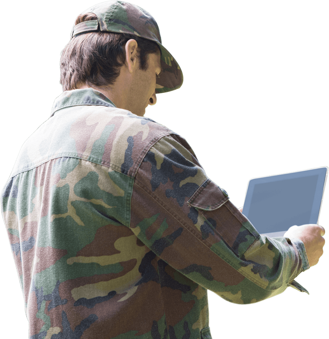 Soldier in Camouflage Uniform Using Tablet on Transparent Background