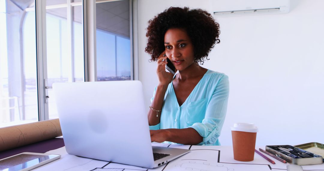 African American Businesswoman Using Laptop in Office - Free Images, Stock Photos and Pictures on Pikwizard.com