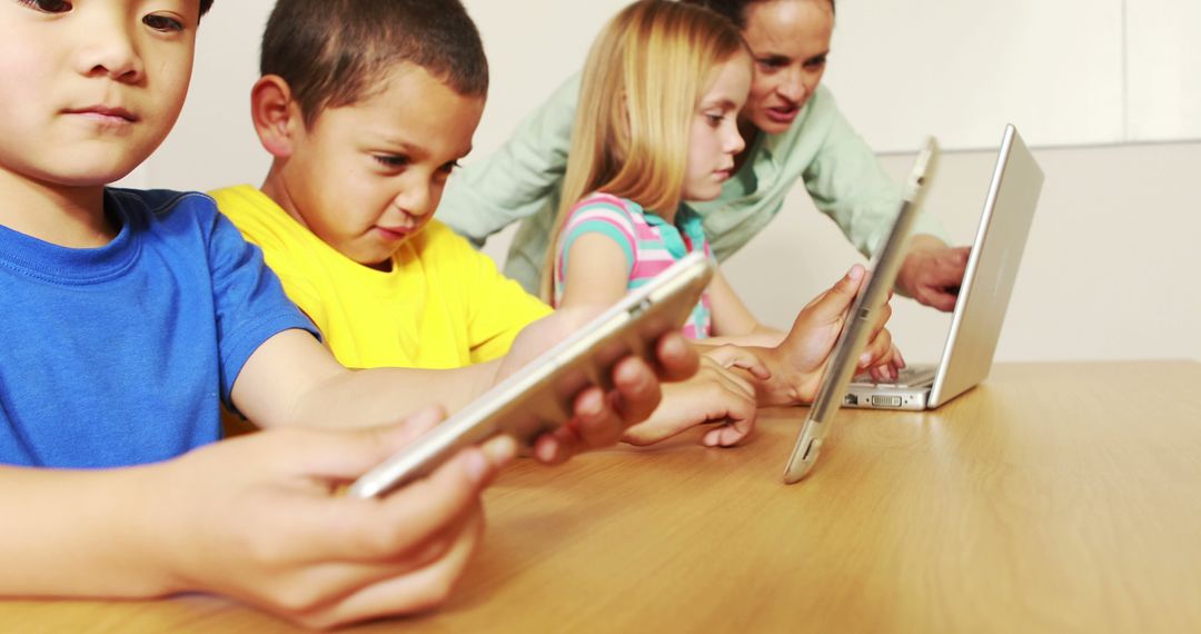 Children Learning with Digital Devices in Classroom - Free Images, Stock Photos and Pictures on Pikwizard.com