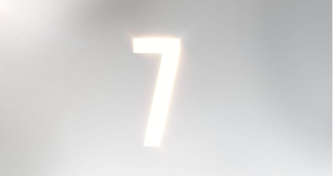 Glowing Number Seven on Soft Light Grey Background