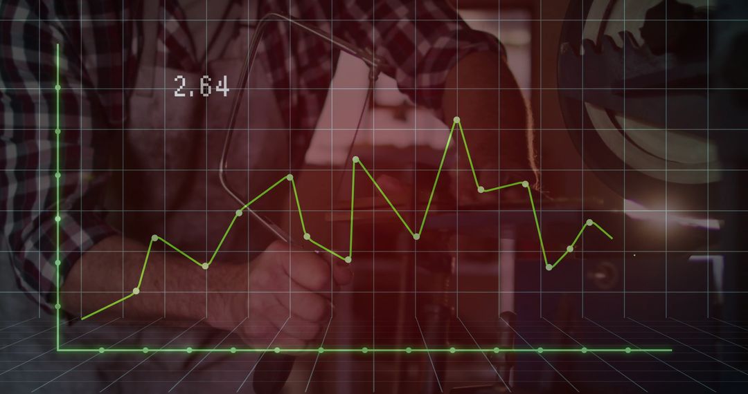 Mechanic Working on Engine Block with Overlay of Graph