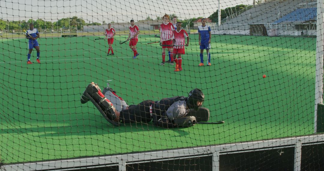 Rear view of a Caucasian male field hockey goalkeeper - Free Images, Stock Photos and Pictures on Pikwizard.com