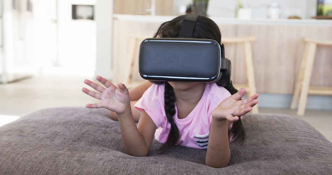 Young Girl Immersed in a Virtual Reality Experience, Exploring New Worlds