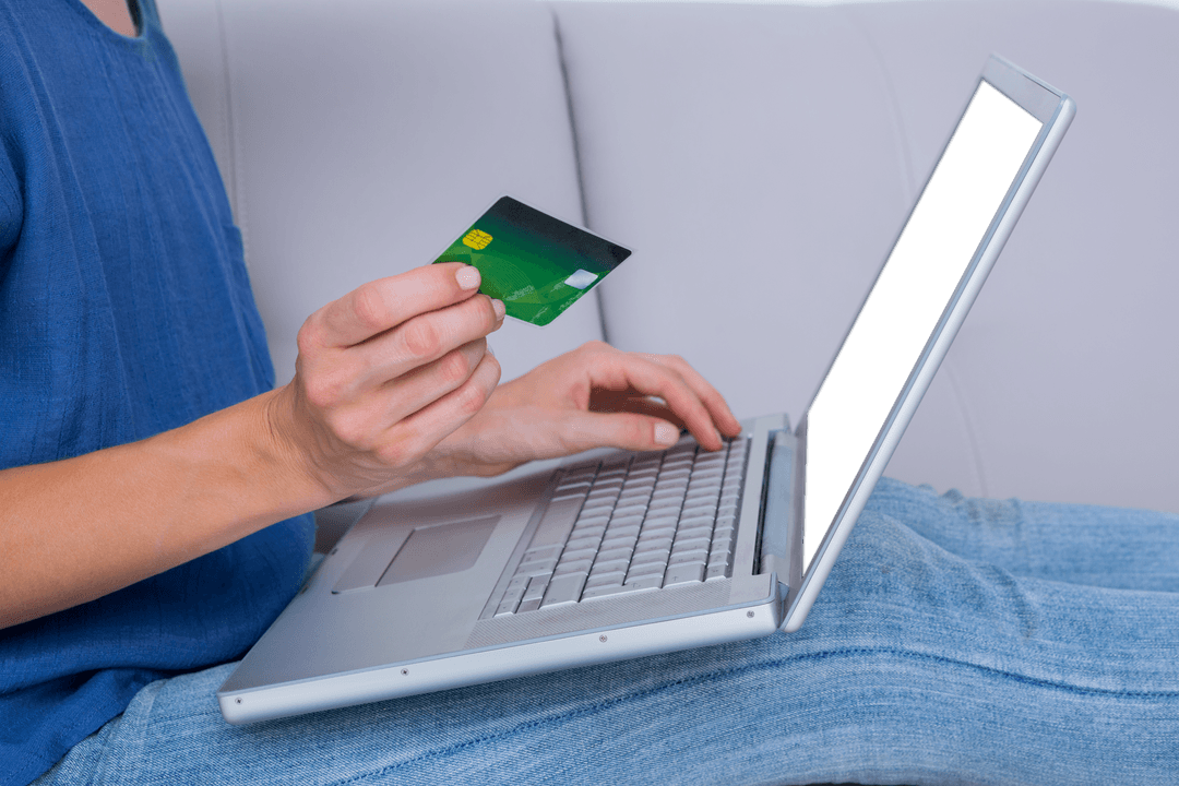 Woman Shopping Online with Credit Card and Laptop
