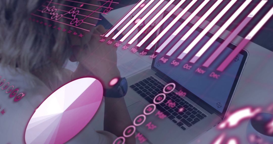 Business Analyst Reviewing Chart Overlays on Laptop in Office